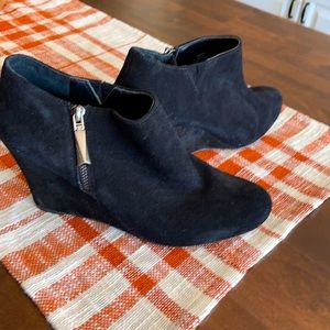 Vince Camuto wedge booties.